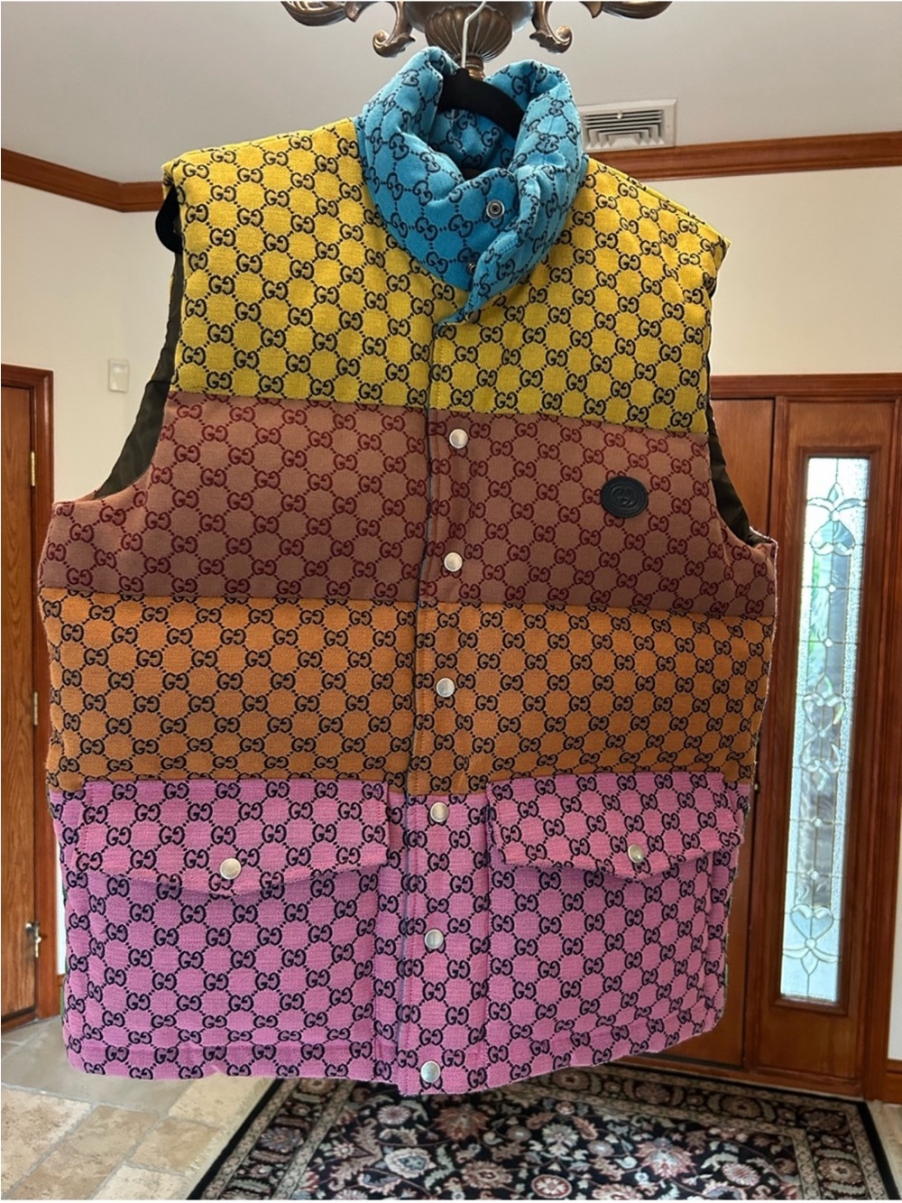 Men’s Gucci, multicolor yellow blue pink patchwork GG down size 48/small vest